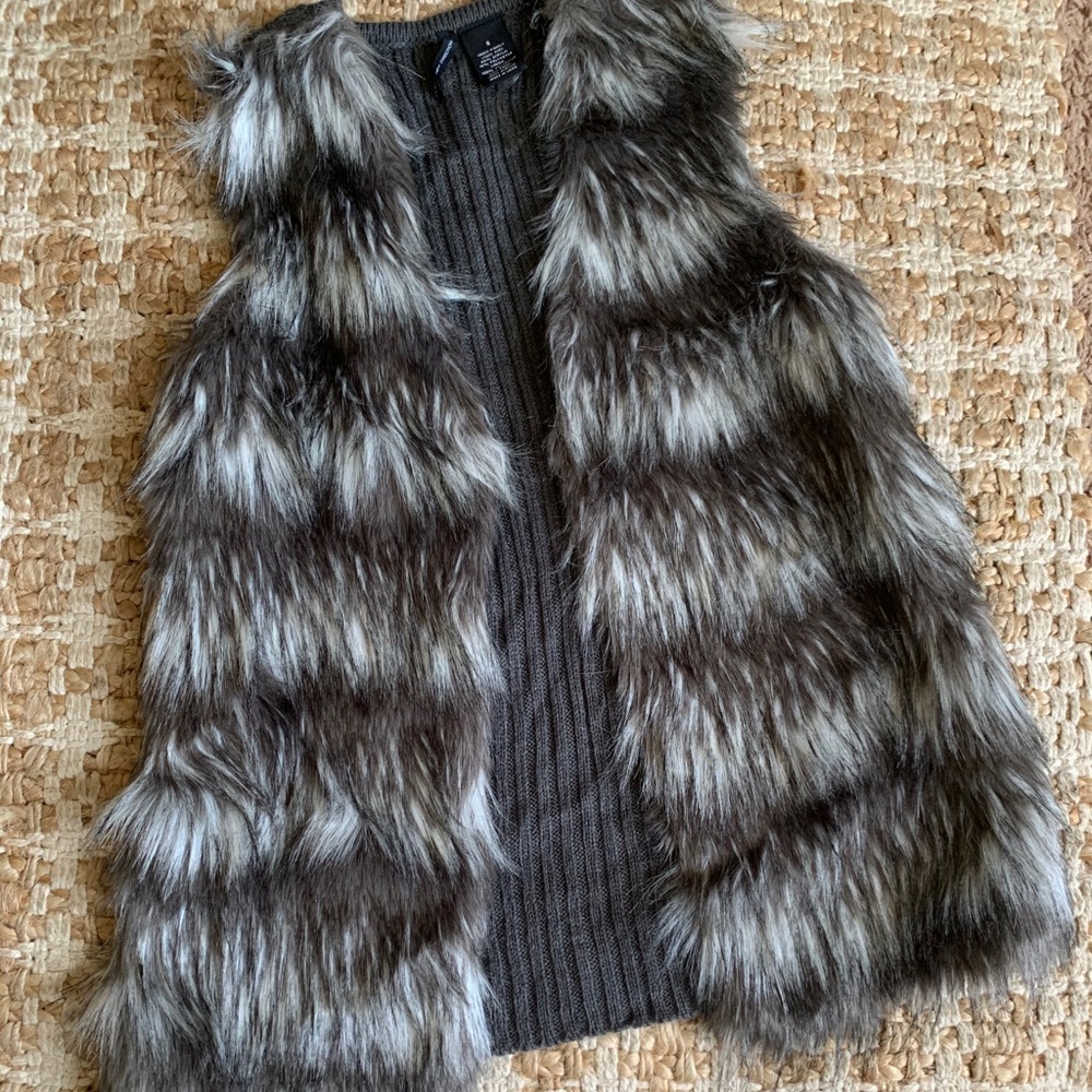 Faux fur vest with gray sweater back